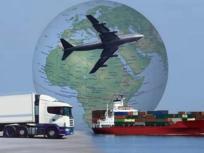 Globe with an aircraft, cargo ship and truck representing worldwide freight movement